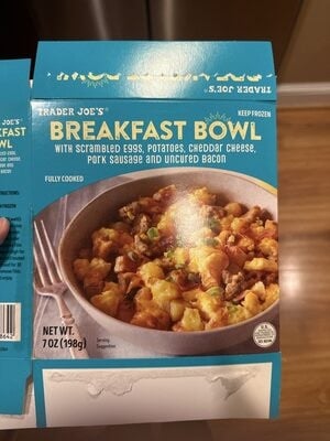 Trader Joe's Breakfast Bowl With Scrambled Eggs, Potatoes, Cheddar Cheese, Pork Sausage And Uncured Bacon packaging