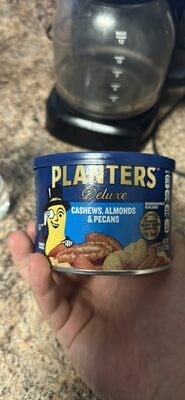 Planters Cashews, Almonds & Pecans package